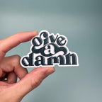 Give A Damn Sticker