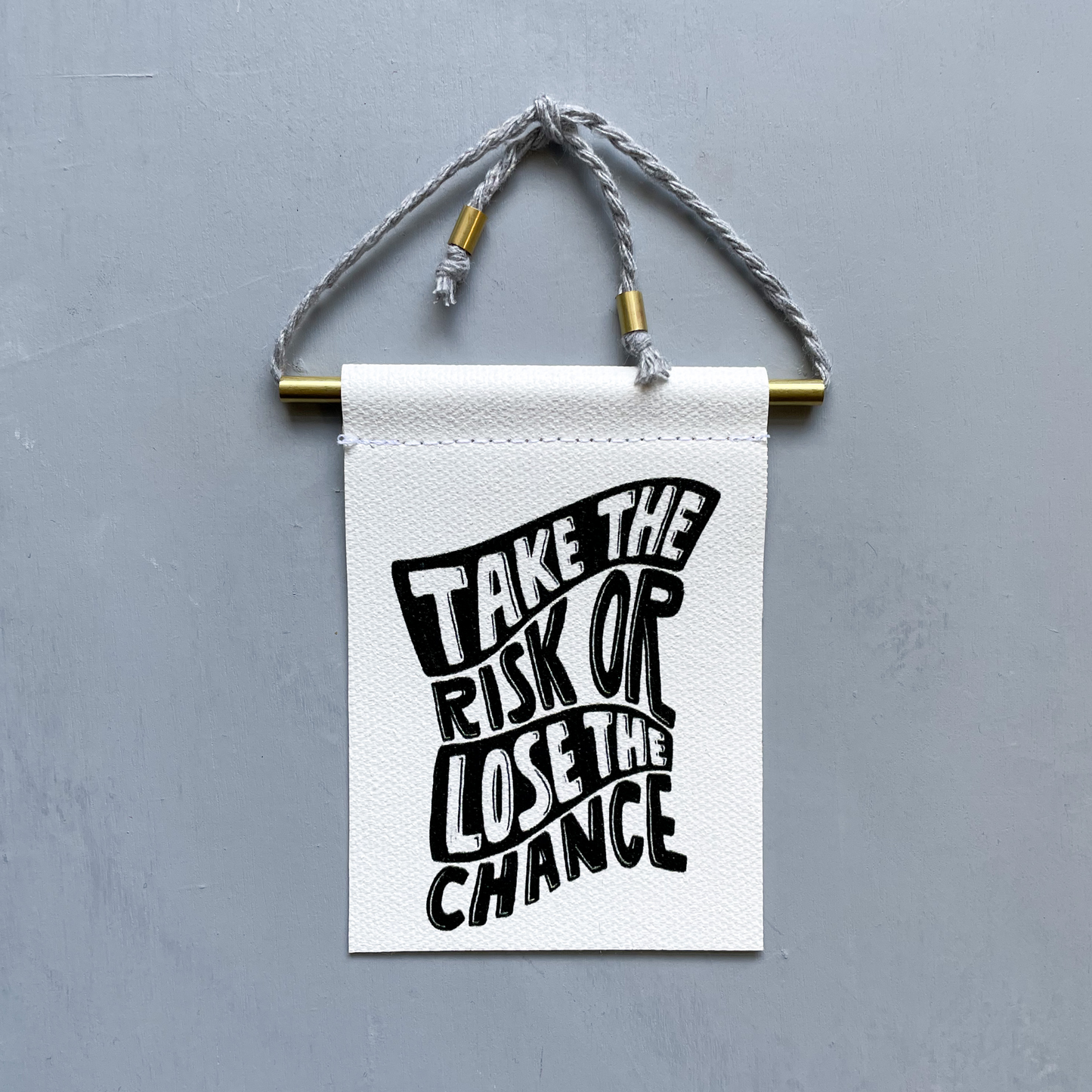 Take The Risk Or Lose The Chance Brass and String Hanging Banner