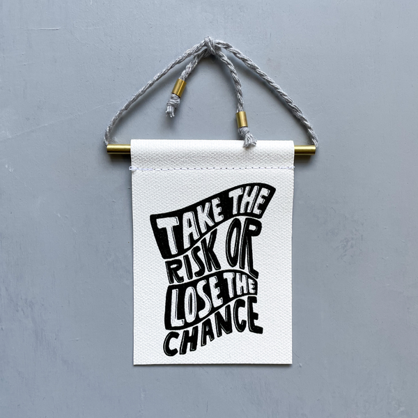 Take The Risk Or Lose The Chance Brass and String Hanging Banner