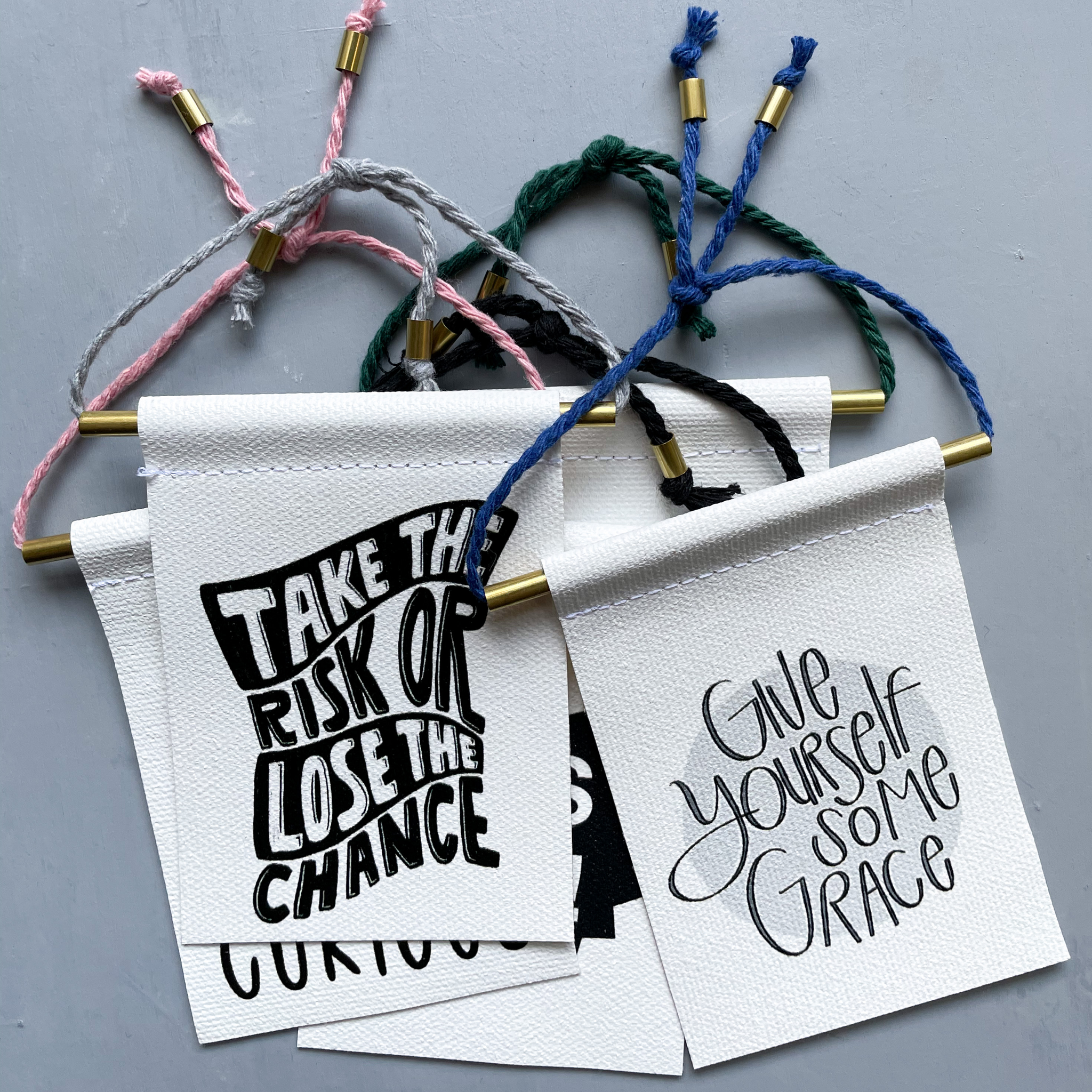Take The Risk Or Lose The Chance Brass and String Hanging Banner