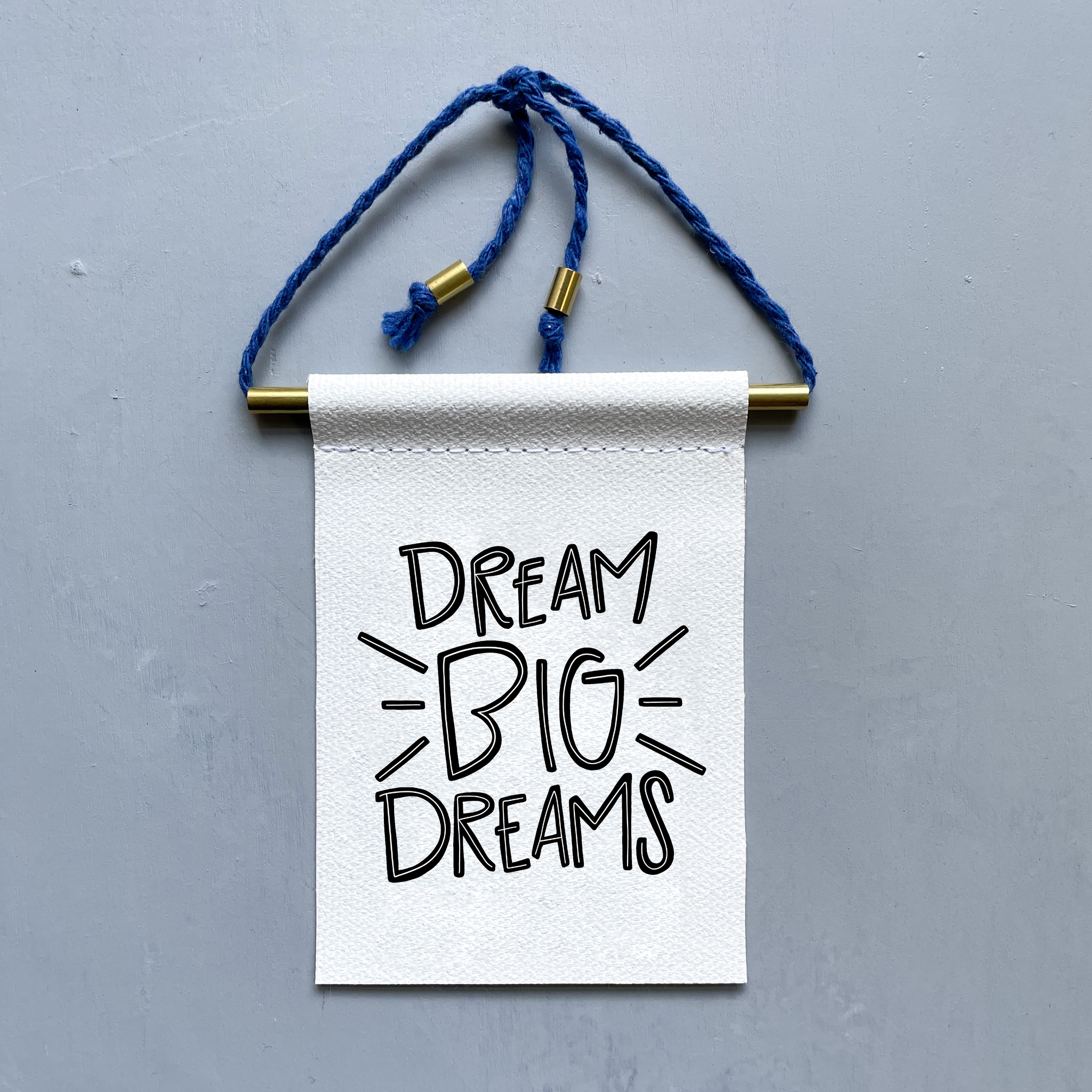 Dream Big Dreams Brass and String Hanging Banner
