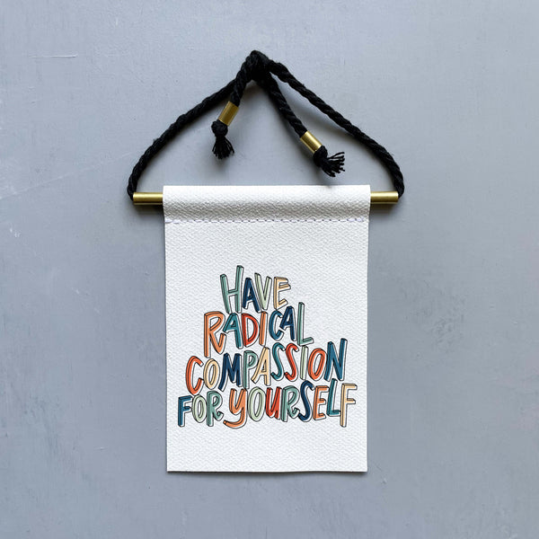Have Radical Compassion For Yourself Brass and String Hanging Banner