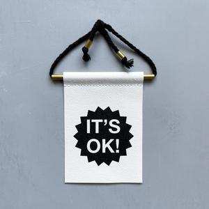 It's Ok Brass and String Hanging Banner