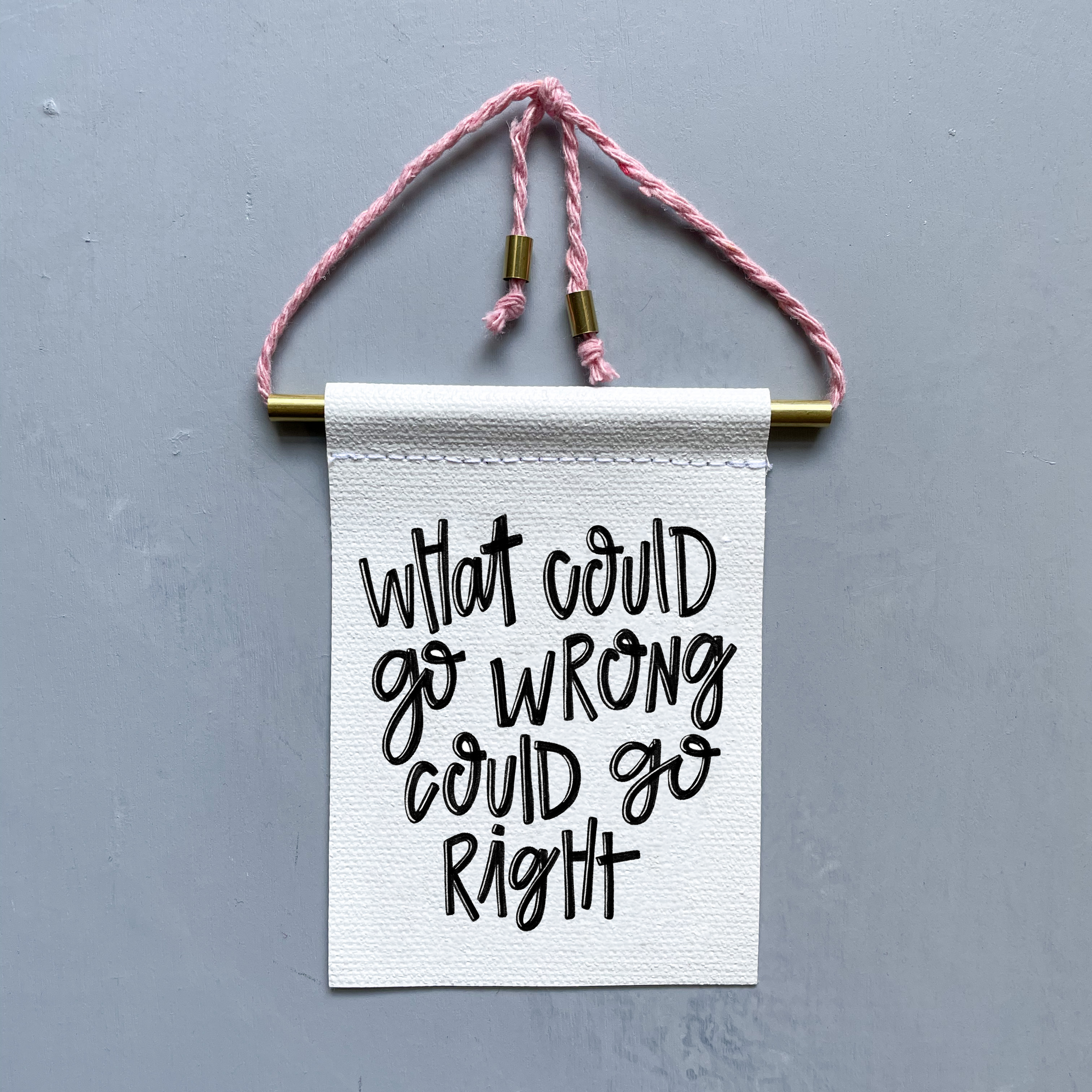 What Could Go Wrong Could Go Right Brass and String Hanging Banner